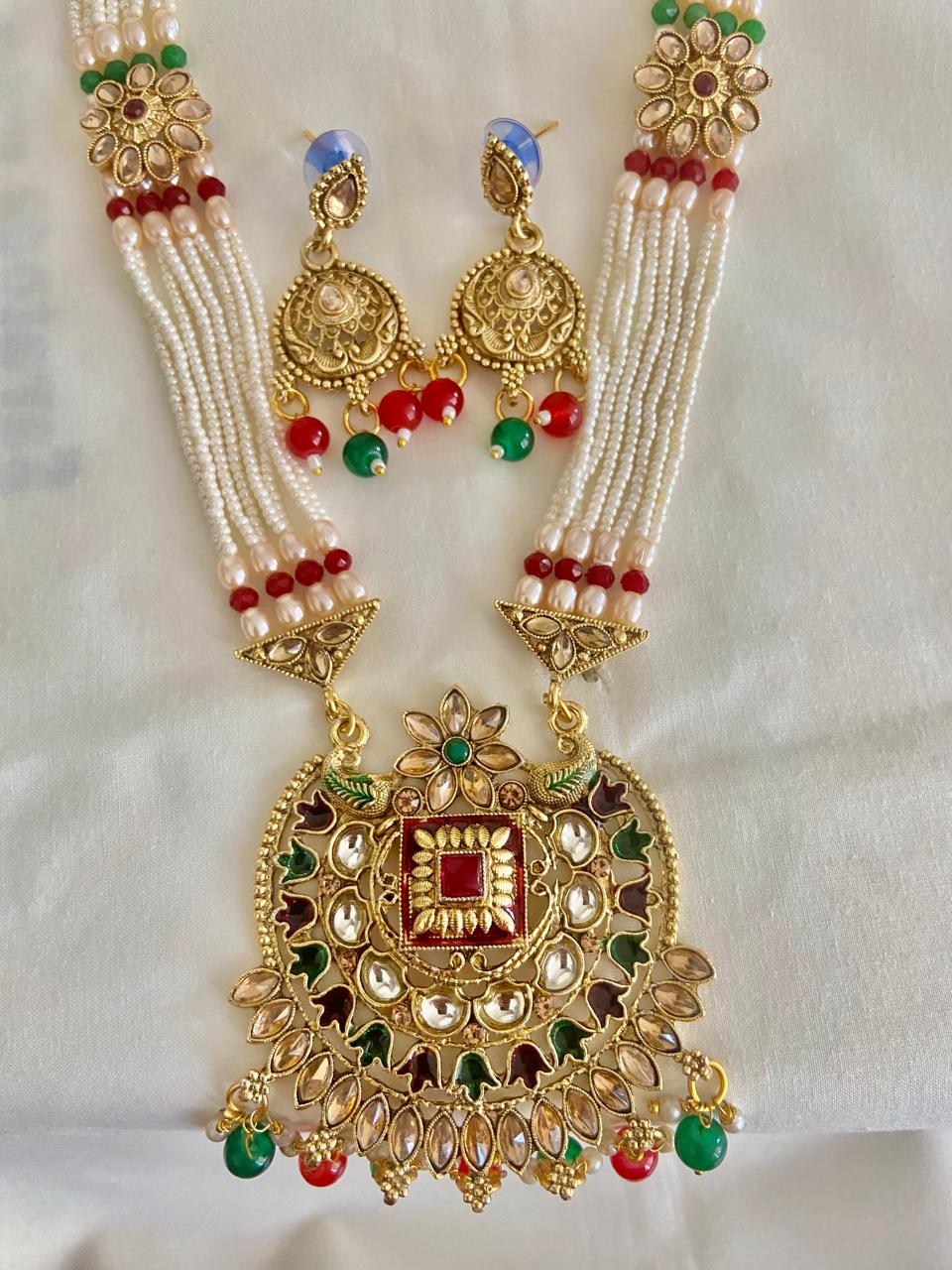 Multicolored Rani Harr with earrings.