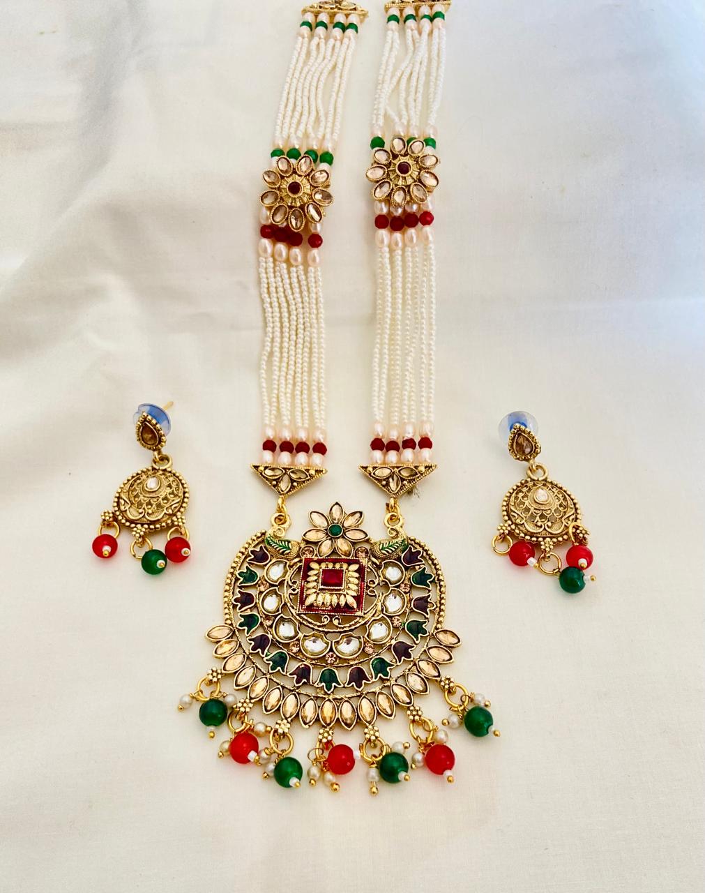 Multicolored Rani Harr with earrings.
