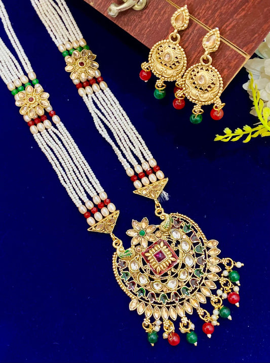 Multicolored Rani Harr with earrings.